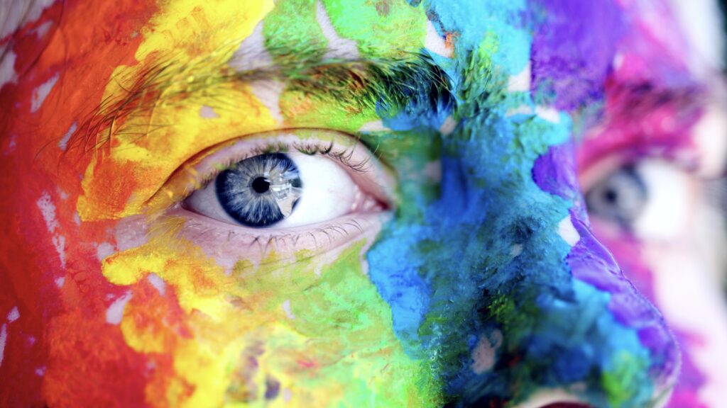 Male Face Painted with Multi-Colors